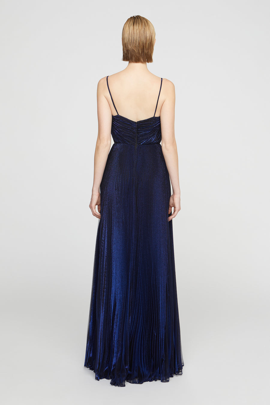 Navy blue evening gown on a white background